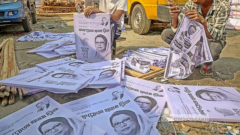 Cloth posters are being made in Dhaka’s Shahjahanpur as the use of paper posters is prohibited in campaigning for the national election. Photo: Abdullah Al Momin