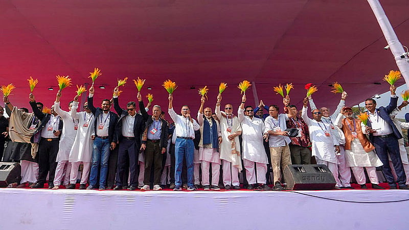 BNP chief Tarique Rahman and his party’s candidates attend a campaign rally at Chattogram’s Polo Ground on Sunday, Jan 25, 2026 with sheafs of paddy – the symbol of the party - in their hands. Photo: BNP Media Cell