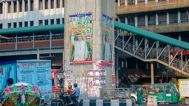 Candidates from all parties continue putting up posters across the country despite the Election Commission’s warning that strict action would be taken against anyone who violates the electoral code of conduct. Photo: Abdullah Al Momin