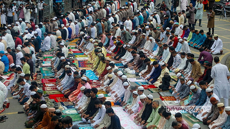 As the crowd overflowed the National Eidgah, many devotees took part in the Eid congregation while standing on the streets on Saturday, Mar 21, 2026. Photo: Abdullah al Momin