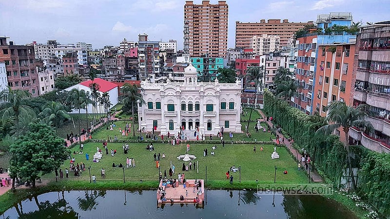 A pond sits before the main building of the Rose Garden, where visitors often linger along its banks. Photo: Abdullah Al Momin