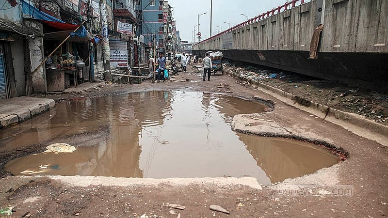 The main road from Dolai Par to Jatrabari in Dhaka is full of potholes. It has been in this condition for more than a year. Photo: Abdullah Al Momin