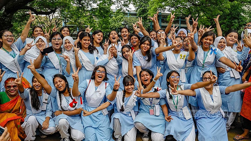 Students of Viqarunnisa Noon School and College show the ‘V’ sign as they celebrate GPA-5 in SSC exams after the publication of results on Sunday, May 12, 2024.