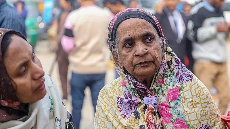 A BDR member's mother waits at Dhaka Central Jail gate as her son is released on bail in the Pilkhana massacre after 16 years. Photo: Abdullah al Momin