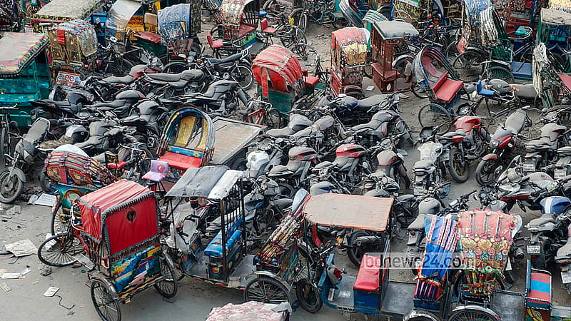 Vehicles have been stored at the dumping station near the Postogola Bridge for long periods. Left exposed year-round, many have fallen into disrepair. Photo: Abdullah Al Momin