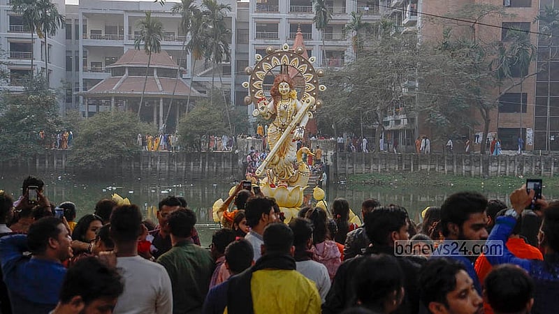 Bidya Debi, the Goddess of Knowledge and another name for Goddess Saraswati, is worshipped at the pond of Jagannath Hall, Dhaka University, on Friday, Jan 23, 2026, during Saraswati Puja. Photo: Mahmud Zaman Ovi