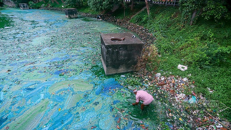 Waste floats on the water of the lake in Hatirjheel. Photo: Abdullah Al Momin