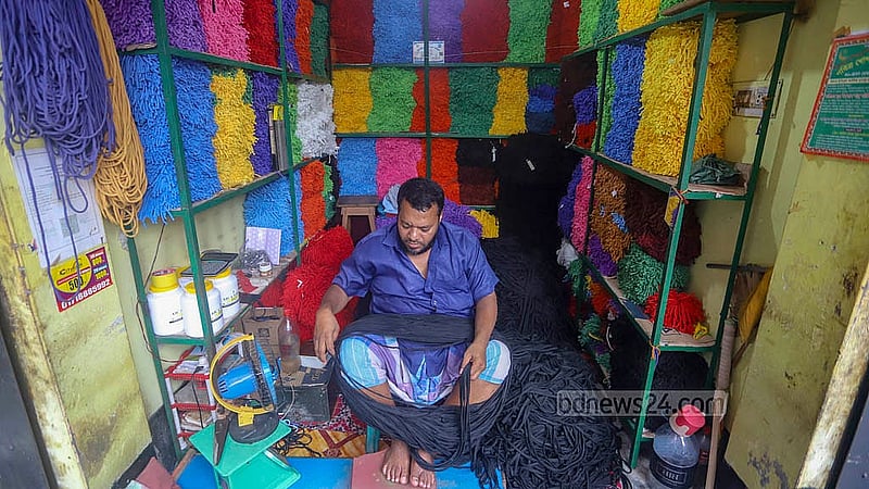 Coloured ropes are used for the handles of paper bags according to customer demand. These ropes are sold at Tk 135 per pound at a shop in Shahid Nagar of Dhaka’s Keraniganj. Photo: Abdullah al Momin