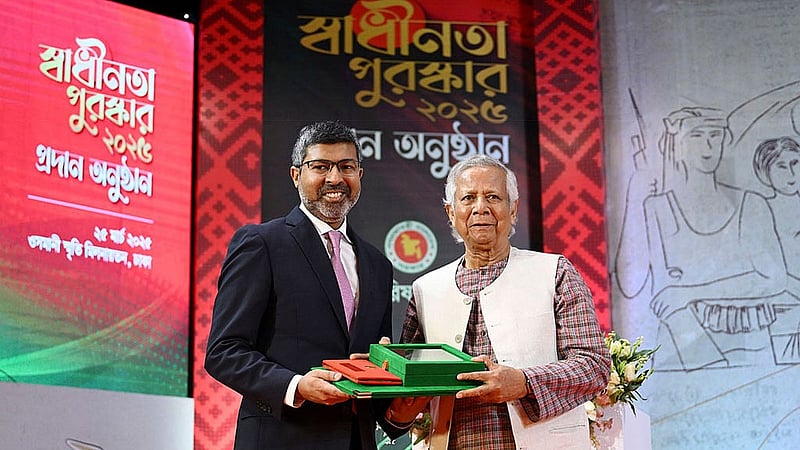 Shameran Abed receives the posthumous Independence Award from Chief Advisor Muhammad Yunus on behalf of his father Sir Fazle Hasan Abed for his contributions to social service. Photo: PID