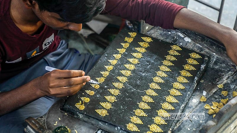 Artisans in Savar’s Bhakurta village use traditional hand-crafting techniques to decorate jewellery as the hub gears up for the Eid rush. Photo: Abdullah Al Momin