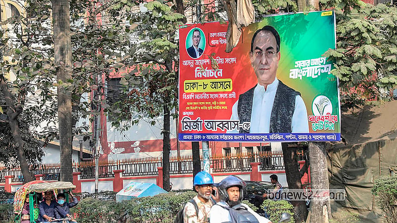Many candidates are not complying with the ruling against using colourful billboards in the national election campaign. Photo taken outside the Shikkha Bhaban in Dhaka. Photo: Abdullah Al Momin