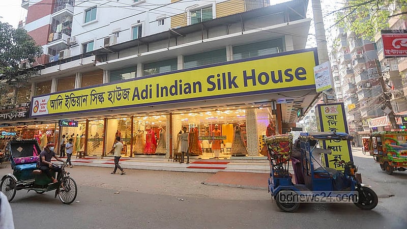 Stores display dresses of many different designs at Benarasi Palli in Dhaka’s Mirpur. Photo: Abdullah al Momin