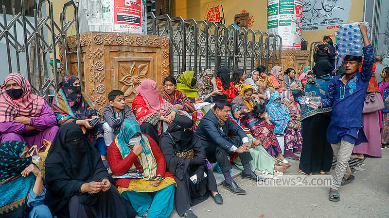 Relatives wait outside as students sit the Dhaka University Faculty of Science admission test for the 2025–26 academic year on Saturday, Dec 27, 2025. Photo: Abdullah Al Momin