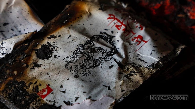 A variety of books burnt in the attack and arson on the second floor of the central office of Udichi Shilpigosthi are stacked for display on Tuesday, Jan 13, 2026. Photo: Mahmud Zaman Ovi