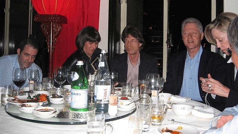 Former US president Bill Clinton, Mick Jagger and Ghislaine Maxwell are seen in this image released by the Department of Justice in Washington, DC, US, on December 19, 2025 as part of a new trove of documents from its investigations into the late financier and convicted sex offender Jeffrey Epstein. US Justice Department/Handout via REUTERS
