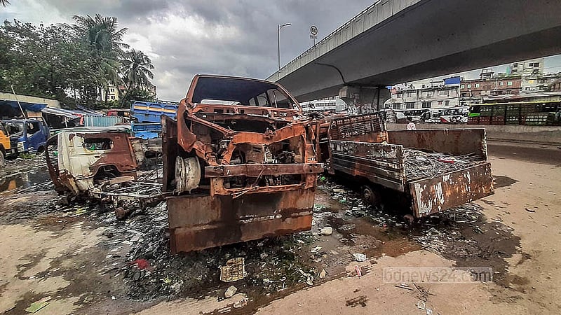 These cars, seized at different times by police, remain abandoned outside Jatrabari Police Station. A foul smell spreads as rubbish is thrown inside some of them. Photo: Abdullah Al Mom