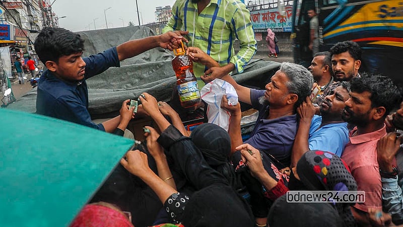 Subsidised edible oil, sugar and lentils are sold from a TCB truck in Dhaka’s Jatrabari on Monday, May 11, 2026. Photo: Abdullah Al Momin