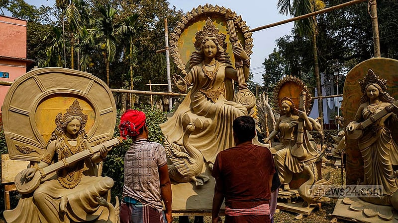 Artisans are busy making idols at Jagannath Hall. The Saraswati idols will be sold at varying prices depending on size and design. Photo: Mahmud Zaman Ovi