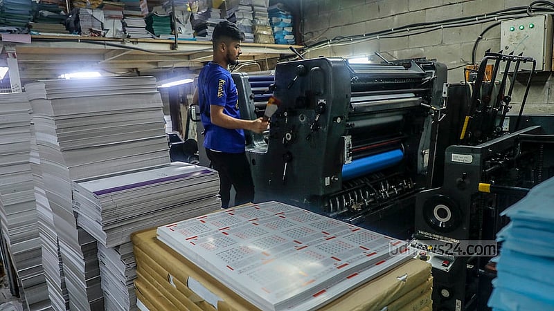 A printing press in Dhaka’s Fakirapul is currently busy printing calendars. Workers are working day and night to deliver the calendars on time. Photo: Abdullah Al Momin