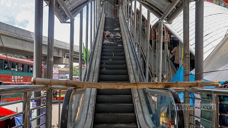 Trash has accumulated on the non-functioning escalator at the Tejgaon College end of the eye-catching Farmgate footbridge. Photo: Mahmud Zaman Ovi