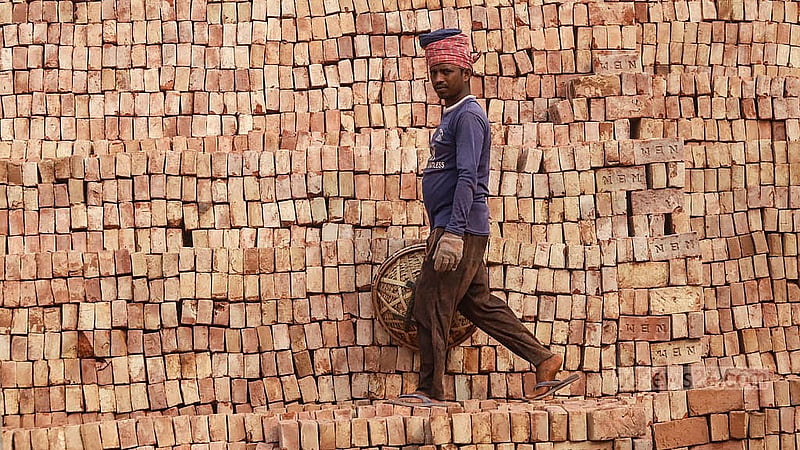 Finished bricks are kept in rows after they are taken out of the furnace. They are sorted according to their quality and sold at Tk 8 to Tk 12 per piece. Photo: Abdullah al Momin
