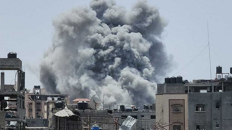 Smoke rises following an Israeli strike, amid the ongoing conflict between Israel and the Palestinian Islamist group Hamas, in Jabalia refugee camp in the northern Gaza Strip, May 18, 2024. REUTERS