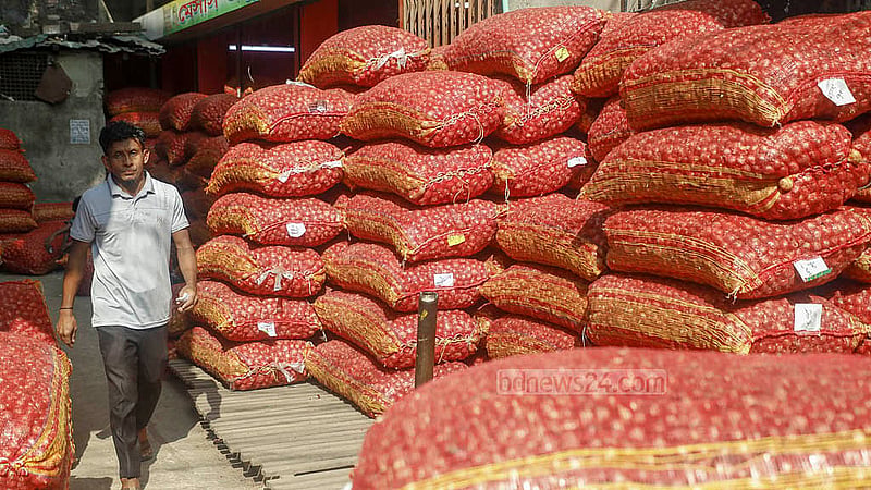 Despite the warehouses of Dhaka’s largest wholesale market in Farashganj being stacked with onions, traders have raised prices, citing a shortage of supply. Photo: Abdullah al Momin