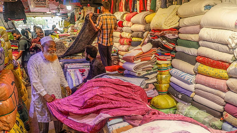 Many people come to the Sadarghat wholesale market in Old Dhaka to buy imported blankets. Photo: Abdullah Al Momin