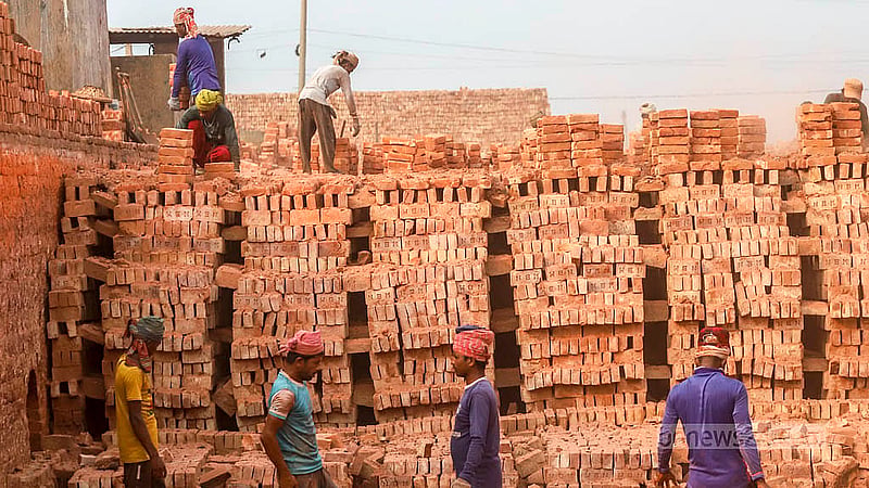 Workers are busy at the tail end of the production season in the brickfields in South Keraniganj's Jazira. Photo: Abdullah al Momin