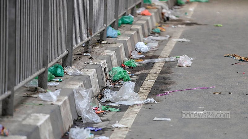 Polythene is dumped along the road in the Dhaka University area. These poly bags clog the drains and cause waterlogging. Photo: Abdullah al Momin