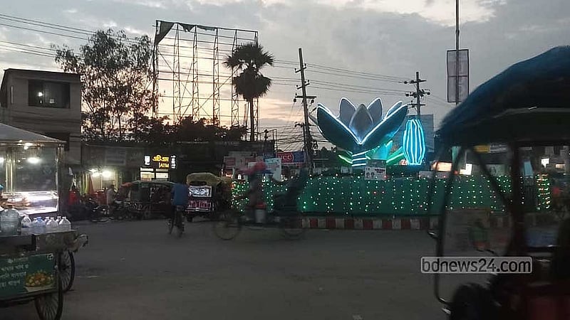 The Shapla Chattar is illuminated by bright decorative lights on the eve of July Uprising Day in Rangpur. Photo: Samiha Mehbub Hiya