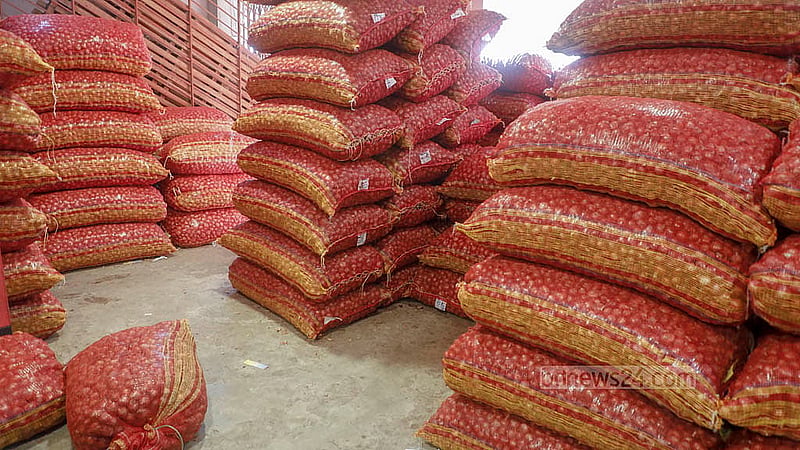 Despite the warehouses of Dhaka’s largest wholesale market in Farashganj being stacked with onions, traders have raised prices, citing a shortage of supply. Photo: Abdullah al Momin