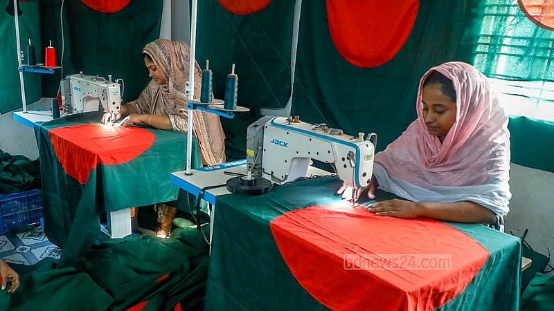 Artisans in Kadamtali work tirelessly stitching red-and-green national flags.Photo: Abdullah Al Momin