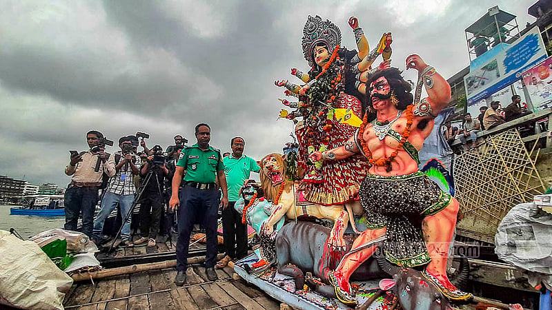 Hindus bid farewell to the Goddess Durga, destroyer of misery, by immersing idols in the Buriganga River at Dhaka’s Waizghat on Thursday, Oct 2, 2025, marking another year of waiting until her return. Photo: Abdullah Al Momin