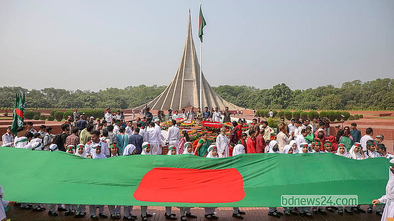 Students carrying the national flag arrive at the National Memorial in Savar on Thursday, Mar 26, 2026, to commemorate Independence Day.