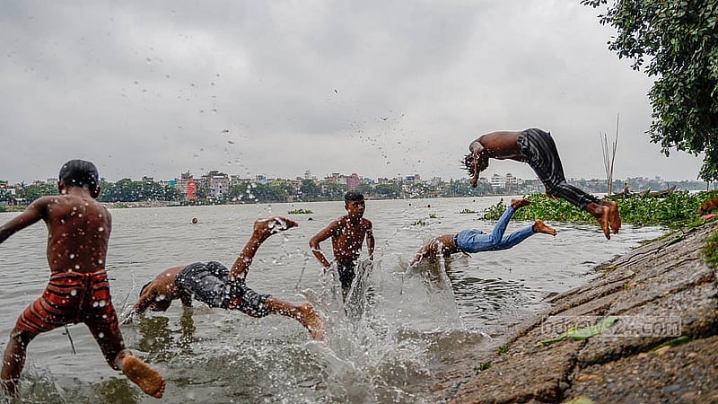 Children play in the fresh water of the Buriganga River. Photo: Mahmud Zaman Ovi