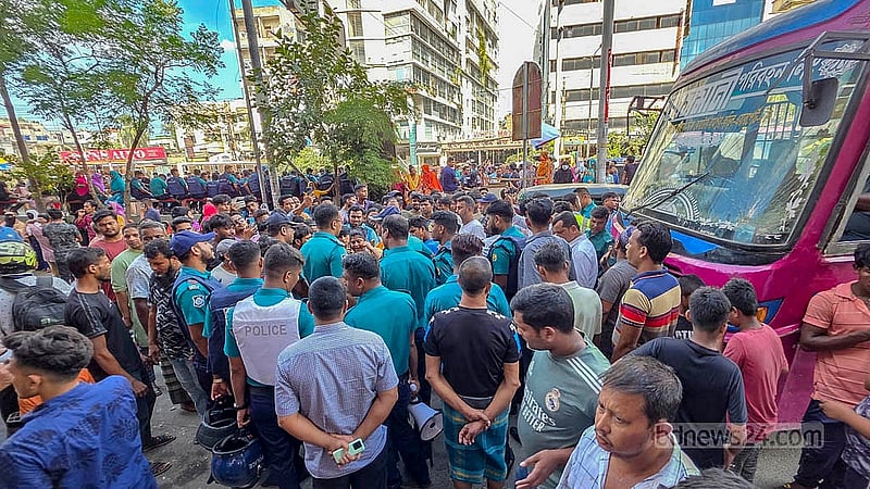 Garment workers block the road in Dhaka’s Kuril on Wednesday, Sept 3, 2025, to demand their wages and benefits. Police urge them to clear the road to ease traffic congestion.