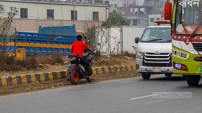 Motorcyclists frequently defy traffic rules, riding against oncoming vehicles in a dangerous bid to save time. Photo: Mahmud Zaman Ovi