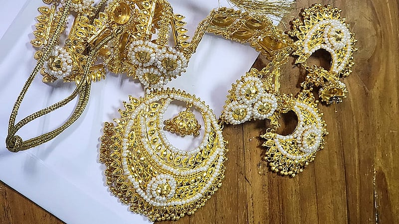The locker also contained gold chains, lockets, and earrings.