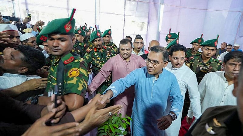 Prime Minister Tarique Rahman exchanges greetings with the public after the main Eid-ul-Fitr congregation at the National Eidgah on Saturday, Mar 21, 2026. Photo: PMO