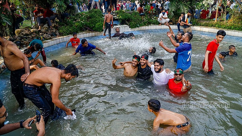 Many jumped into Ganabhaban’s water reservoir in celebration. Photo: Mahmud Zaman Ovi