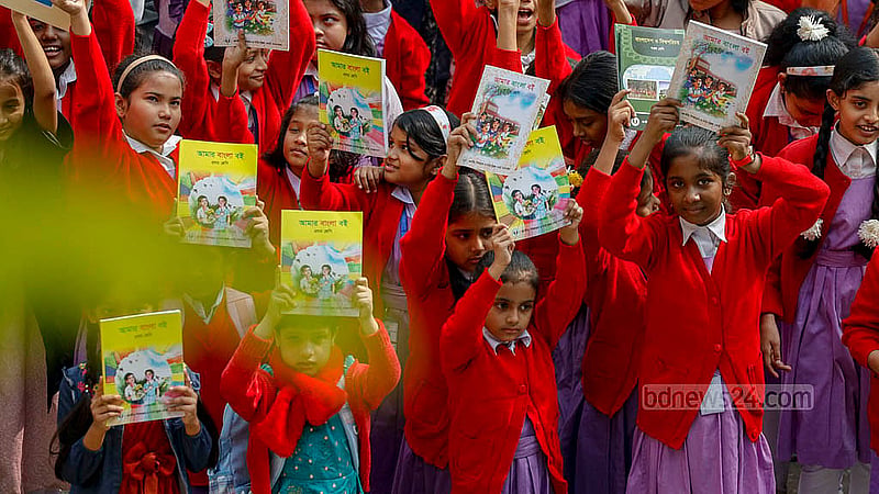 Some students of Dhaka's Azimpur Government Girls School and College received new books on Wednesday, Jan 1, 2025. Photo: Mahmud Zaman Ovi