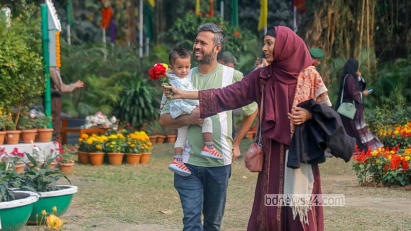 Many families have come to Ramna Park to visit the Flower Festival, organised for the first time by the Public Works Department. Photo: Abdullah al Momin