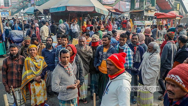 Every morning, a "market" for day labourers opens in the Hemayetpur bus terminal area of Savar, on the outskirts of Dhaka. Day labourers gather there early in the morning in search of work. Photo: Abdullah Al Momin