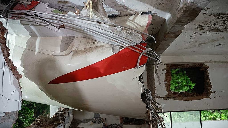 A view shows debris at the crash site after an Air India aircraft, bound for London's Gatwick Airport, crashed during take-off from an airport in Ahmedabad, India June 12, 2025. REUTERS