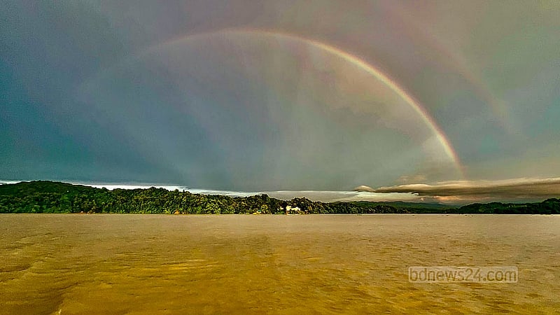 A rainbow stretches across the sky after the rain near Rangamati’s Kaptai Lake. Photo: Samir Mallik