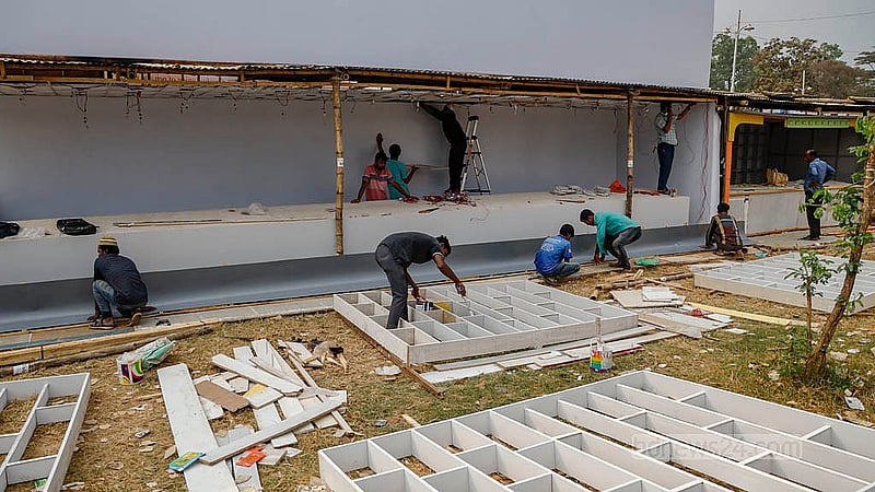 Workers remain busy finishing stalls at Suhrawardy Udyan. Although the fair will feature stalls of many sizes, there will be no pavilions this year. Photo: Mahmud Zaman Ovi