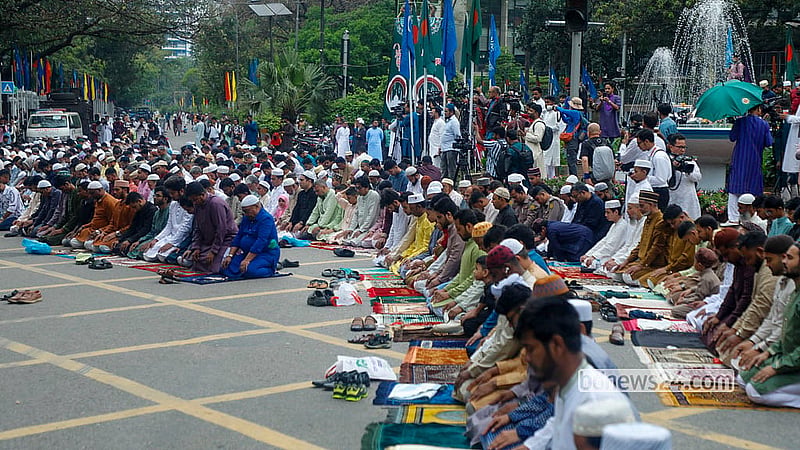 As the crowd overflowed the National Eidgah, many devotees took part in the Eid congregation while standing on the streets on Saturday, Mar 21, 2026. Photo: Abdullah al Momin