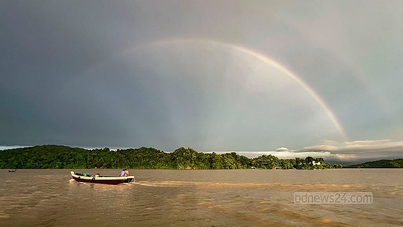 A rainbow stretches across the sky after the rain near Rangamati’s Kaptai Lake. Photo: Samir Mallik