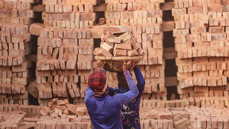 Finished bricks are taken out of the furnace at the brickfields on the banks of the Dhaleshwari River in South Keraniganj's Jazira. Photo: Abdullah al Momin